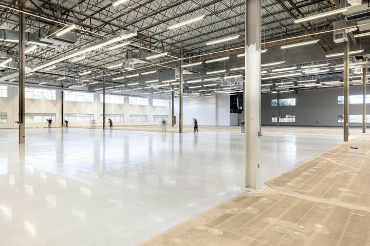 Empty modern warehouse interior with polished concrete floors